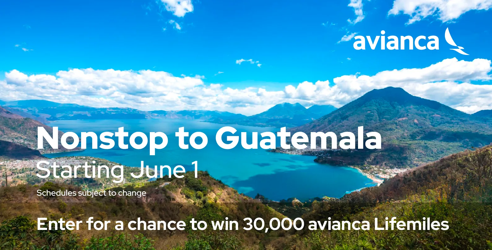 Lake in Guatemala with mountains and clouds in the sky
